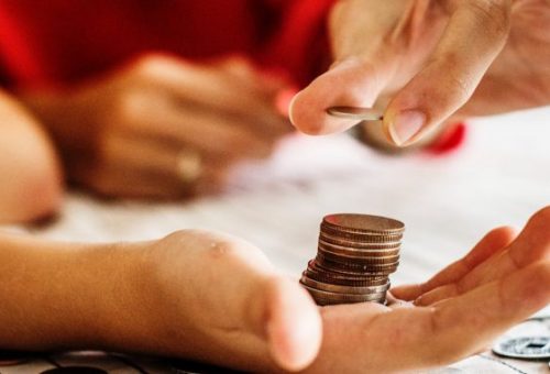 coins in someone hands